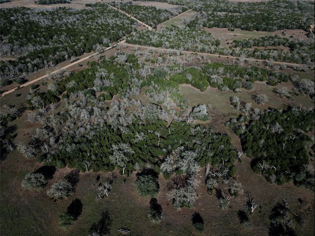 Wide aerial view of the property